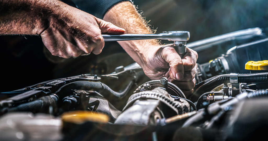 Mechanic working on engine